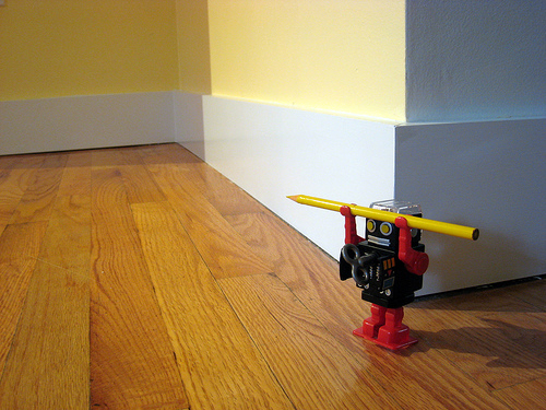  pencil on a robot toy