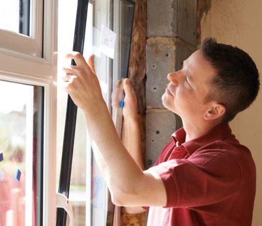 man in window