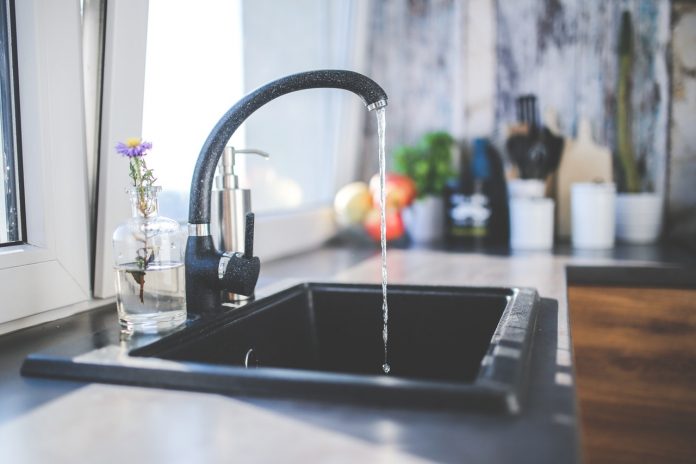 Water is flowing at the best kitchen faucet