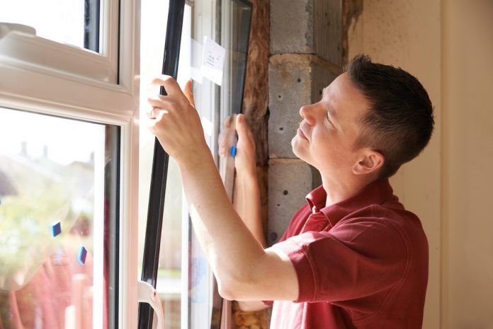 man in window
