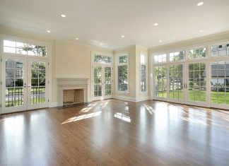 Best Replacement Windows: Features, Price, Pros, And Cons Living space with a wall of windows